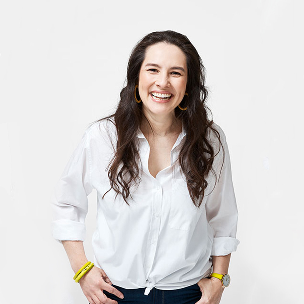 Business women smiling.