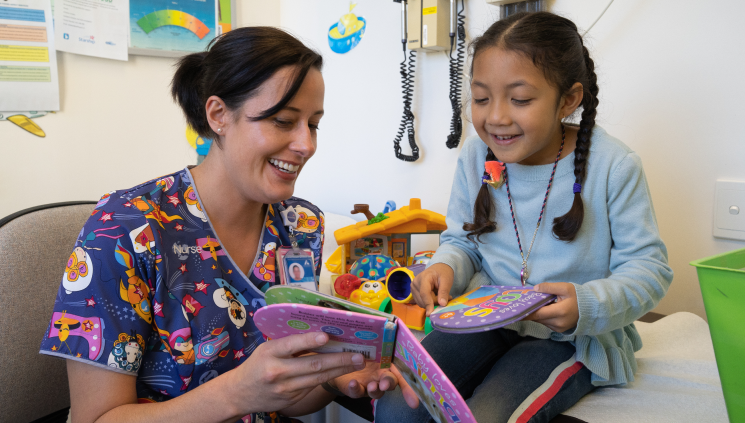Starship nurse reading to a girl
