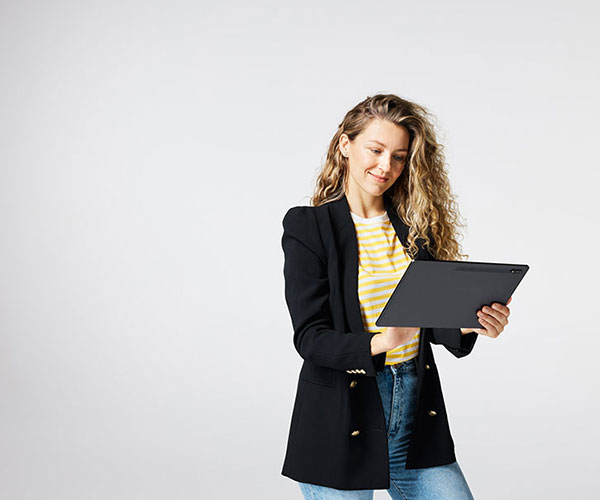 Business women checking iPad.