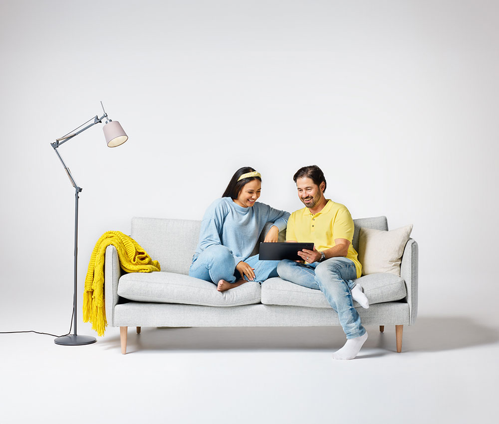 Family on the couch together.