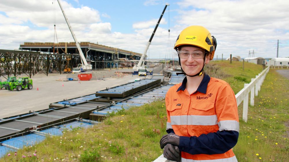 Lexi Richards overlooking construction of OEC5 at Nga Tamariki